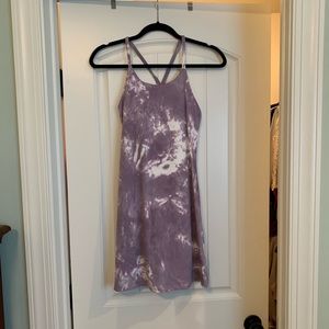 Athletic dress with built in bra and shorts with pockets.